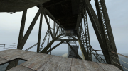 Under the bridge.